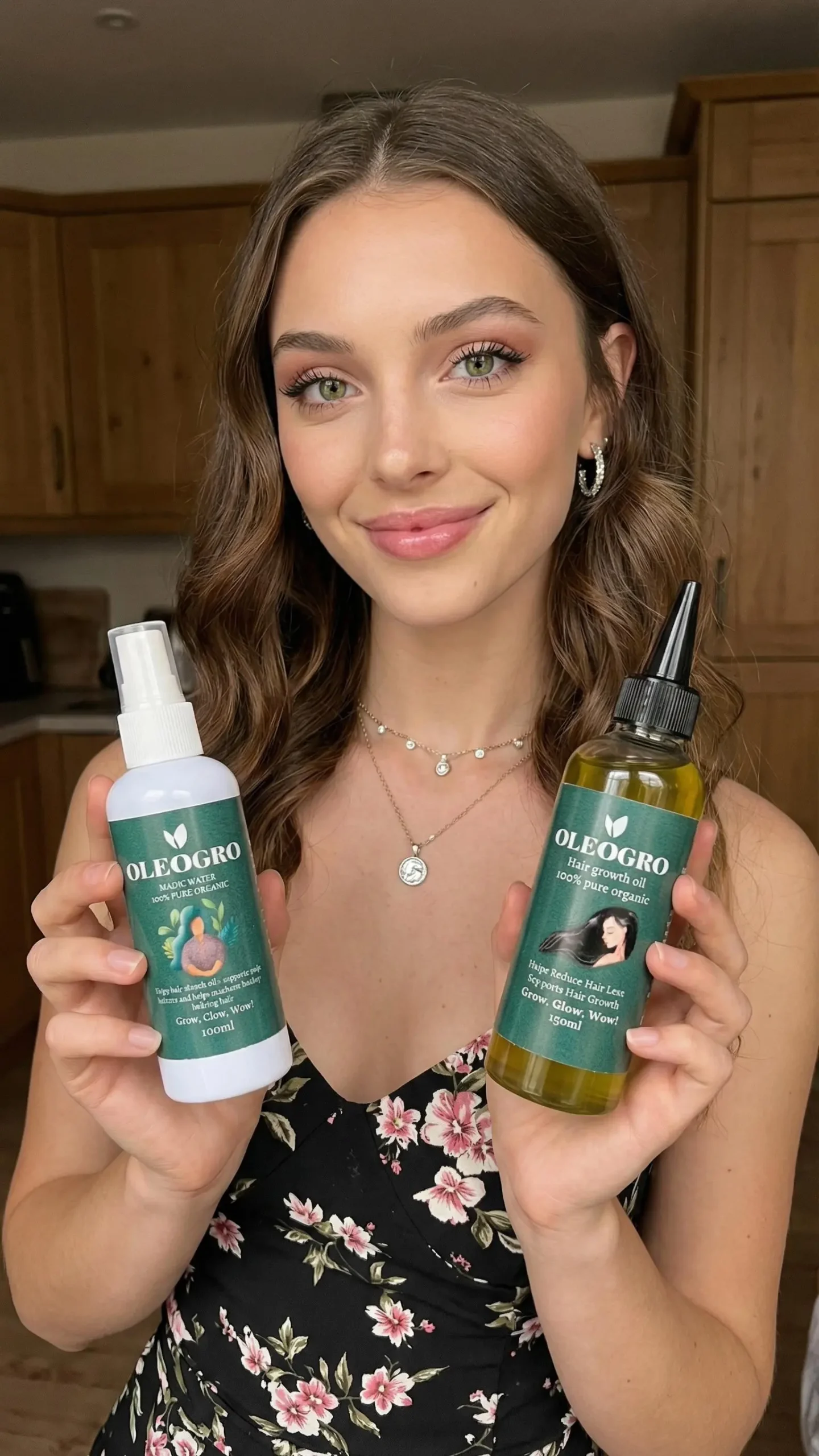 Woman holding Oleogro hair growth oil and Magic Water